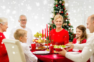 smiling family having holiday dinner at home